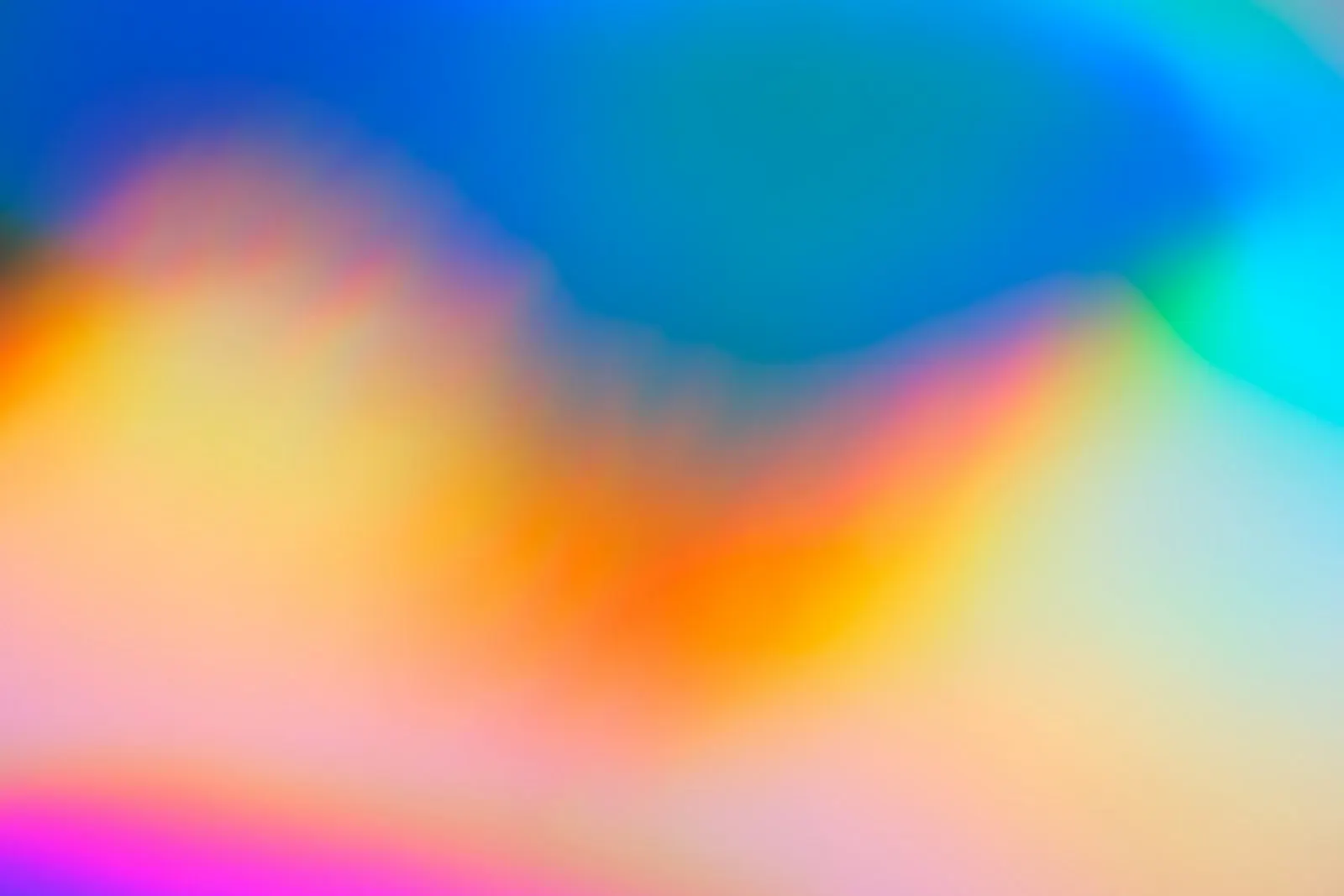 Abstrakt färgskimmer i blått, orange och rosa